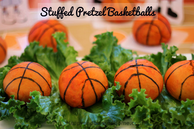 Stuffed Pretzel Basketballs Recipe with Sausage and Cheese stuffed Preztel Balls decorated to look like basketballs from HappyandBlessedHome.com