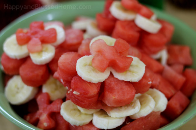Fun idea for a party - make a bowl of flower shaped fruits for a summer party - tips from HappyandBlessedHome.com