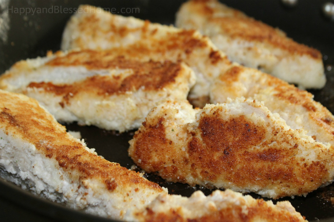 Fry the exterior of the chicken until golden brown - Chicken Parmesean recipe by HappyandBlessedHome