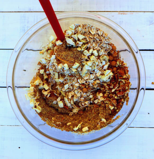 Use a spoon or spatula to mix the ingredients for your Caramel Apple Pecan Energy Bites