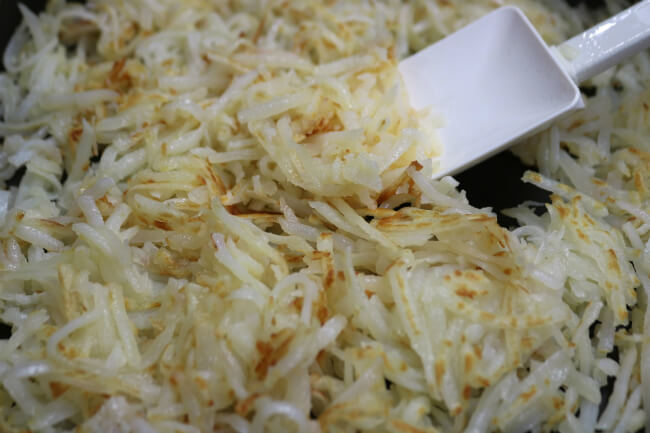 Fry Hashbrowns to make Hash browns, Eggs and Bacon Breakfast Casserole