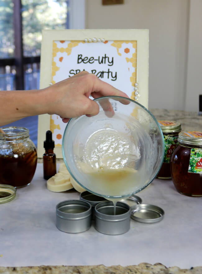 Once melted - you can easily pour the honey lip balm mix into the containers