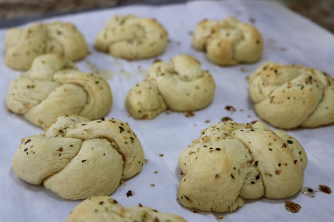 Fresh from the oven! An easy recipe and tips on how to make and tie Homemade Garlic Knots.
