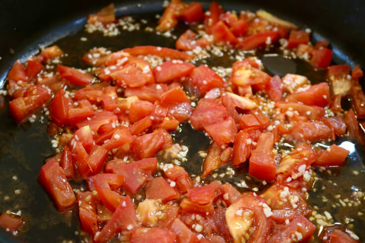 tomatoes-sauted-in-a-pan-for-this-slow-cooker-beef-brisket-with-tomatoes-and-onions-recipe