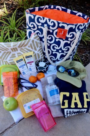 10 Outdoor Playdate Essentials for Moms with waterproof bag and carry-all bag