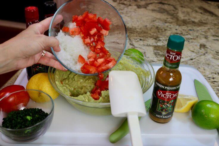 Hand chopped tomatoes are the best for Heartwarming Easy Recipe Traditional Mexican Guacamole