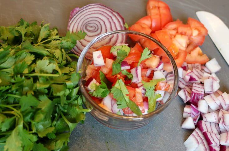 Fresh pico de gallo paired with Grilled Carnitas Tacos Recipe