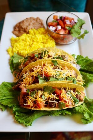 Enjoy with shredded cheese - Grilled Carnitas Tacos Recipe