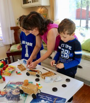 Showing the boys How to Make a Graham Cracker Cookie Train Recipe