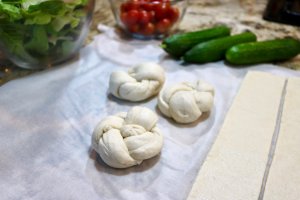 Tie and Tuck the ends to make hearty Garlic Knots